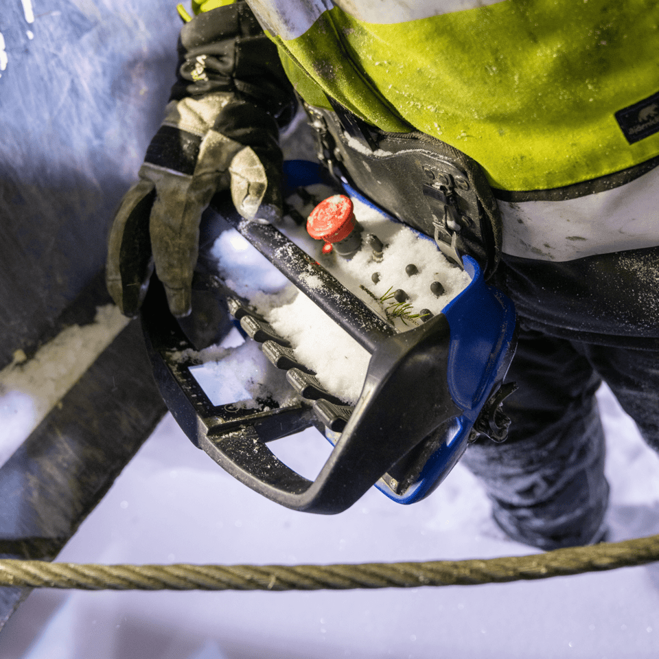 remote control being used in cold conditions and snow